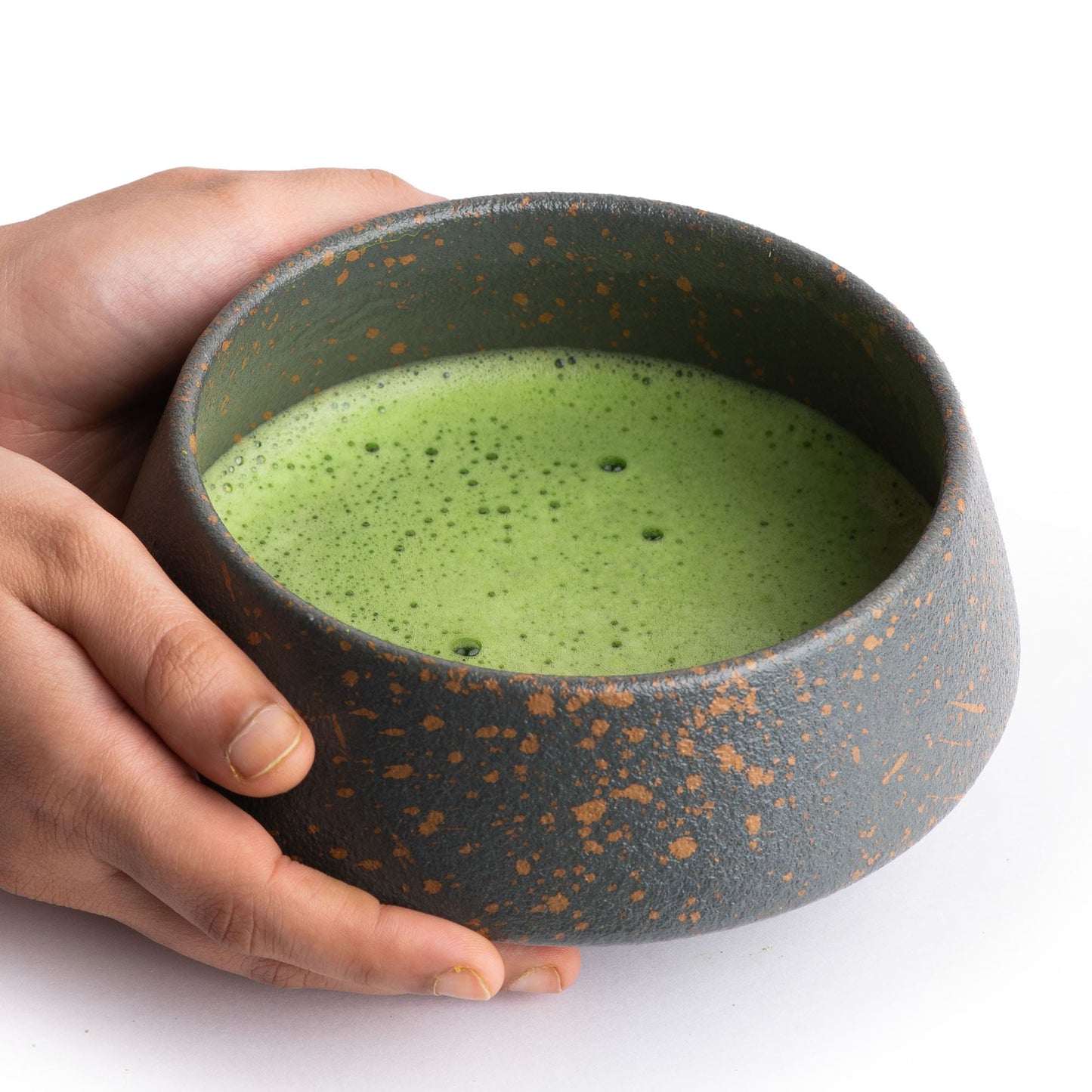 holding matcha green tea bowl